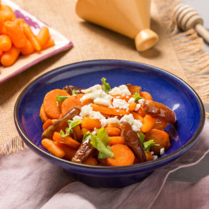 Zanahorias asadas con especias, vinagreta y queso de cabra